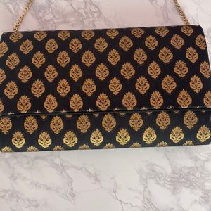 Patterned gold and navy blue purse